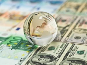 Translucent Globe on Euros and Dollars