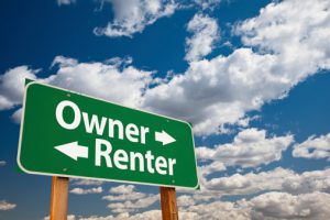 Owner, Renter Green Road Sign Over Clouds