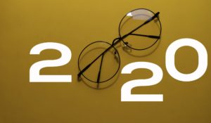 Happy New Year 2020 with Glasses isolated on yellow background