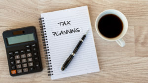 Tax Planning text on Note pad