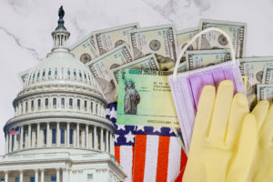 Senate stimulus deal includes individual checks virus economic stimulus plan US 100 dollar bills currency on American flag Global pandemic Covid 19 lockdown