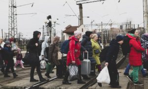 Ukrainians arriving at the train station in Lviv, Ukraine