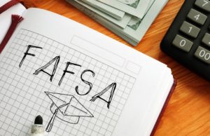 Free Application for Federal Student Aid FAFSA is shown on the photo using the text