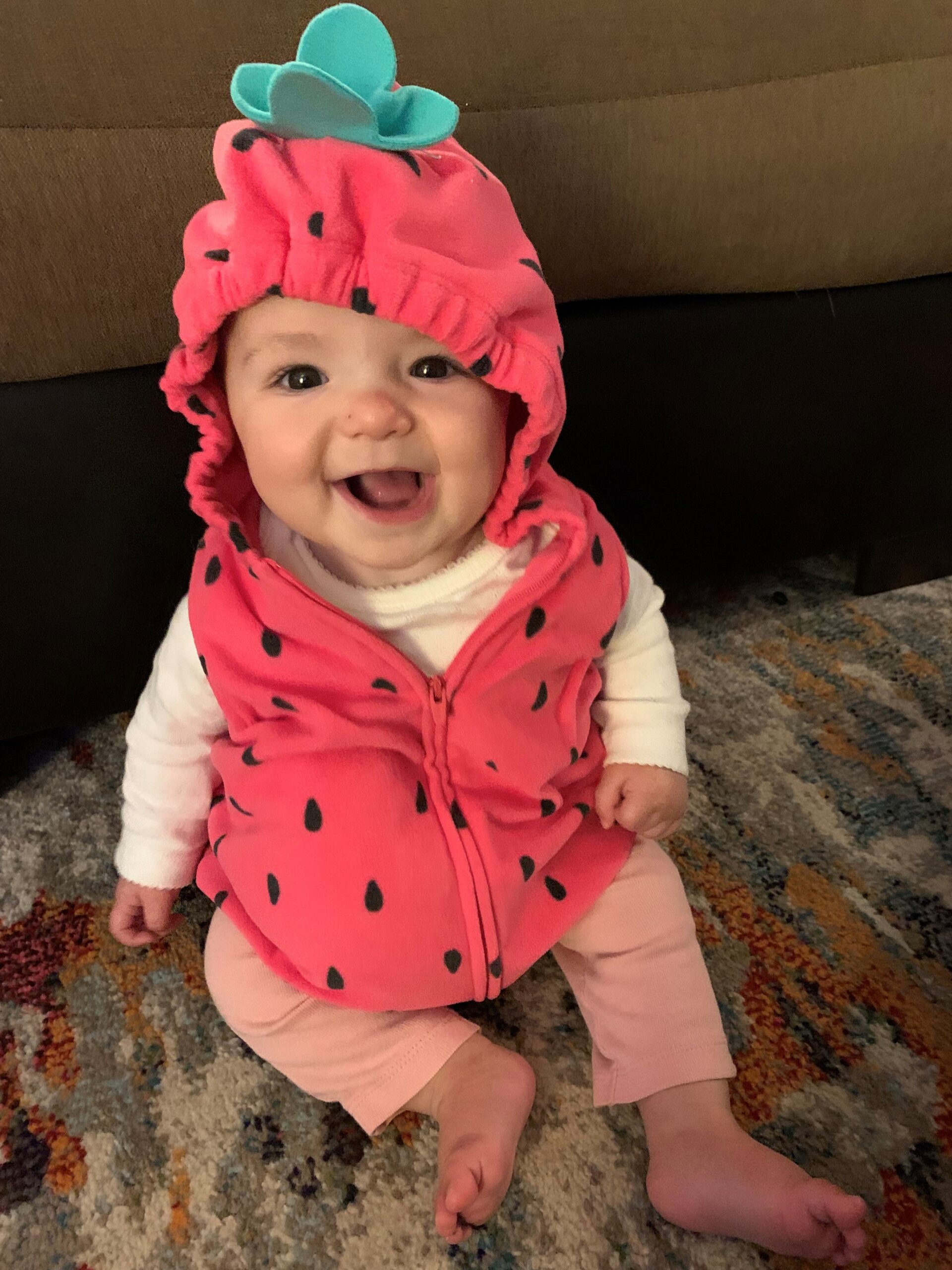Lauren M.'s daughter, Aria, as a happy little berry.