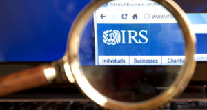 2025-10-07_IRS website through a magnifying glass