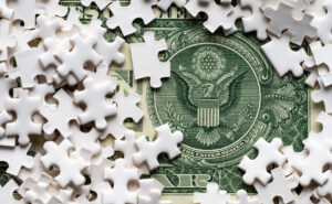2025-10-07_Dollar bill with puzzle pieces