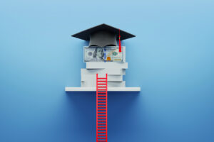 Student Loan and College Planning Mini-Series Part Two Red ladder leaning on stacks of one hundred American dollar bills and tassel on blue wall. Horizontal composition with copy space. Educational savings concept.